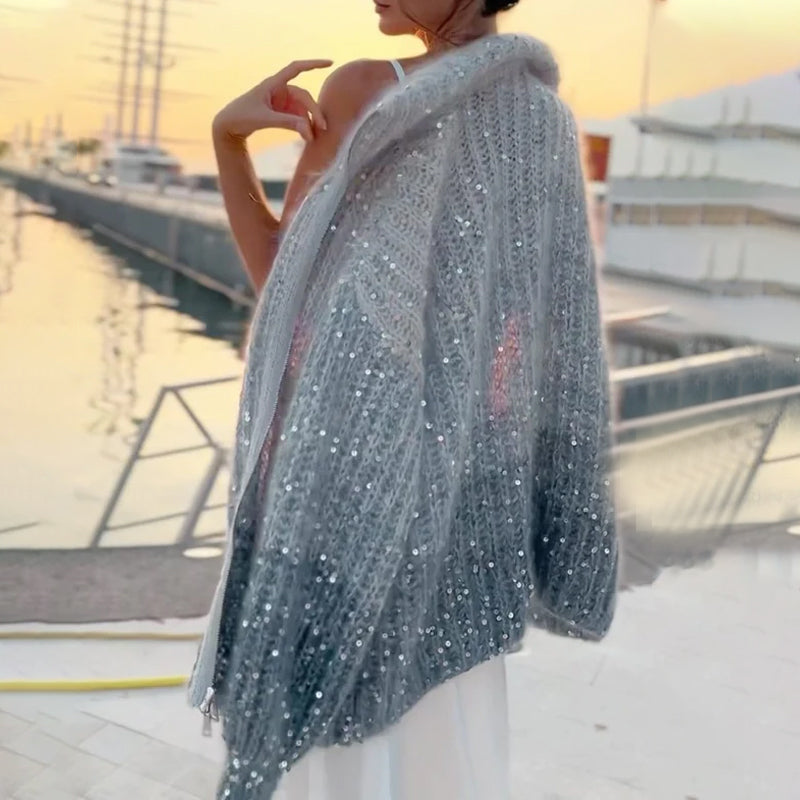 Genser i strikket stoff med ensfargede paljetter